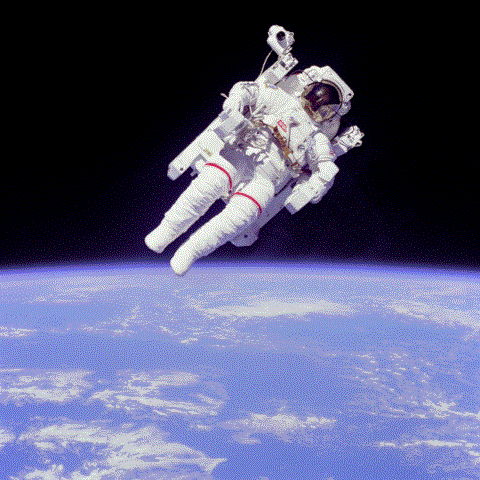 A NASA astronaut floating above the Earth